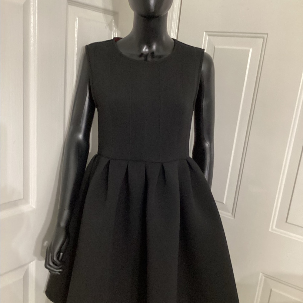 Black “Gracia” babydoll dress, fabric neoprene, size Large.